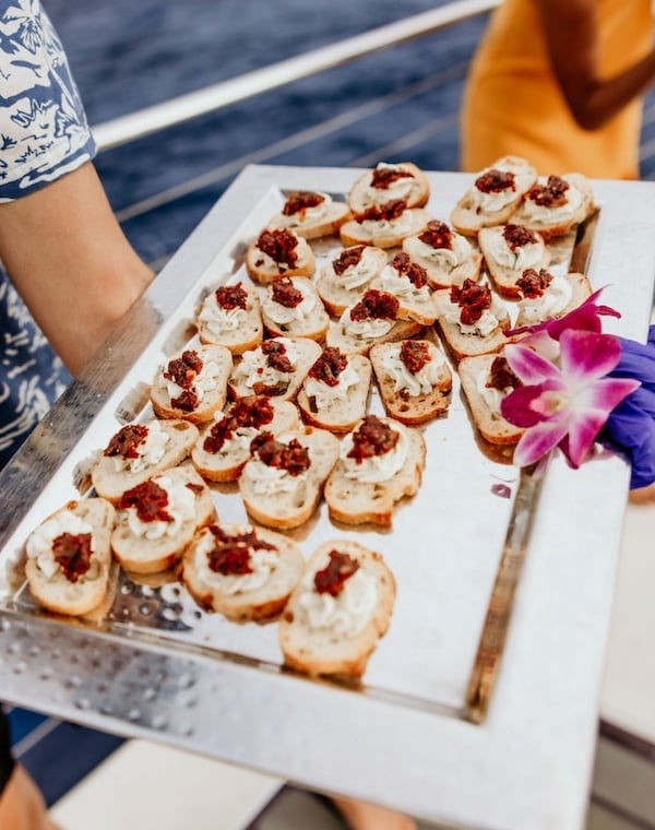 Tray of appetizers being served on private boat rental Kauai.