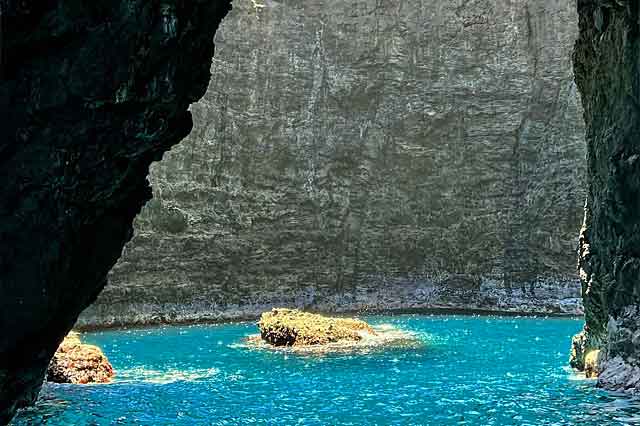 Kauai zodiac Na Pali tours looking into a sea cave.