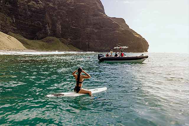 Rafting Na Pali Coast out of the zodiac boat snorkeling.