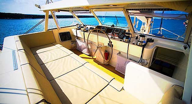 Kauai Hawaii catamaran cockpit of a full sailing yacht that's also a power catamaran.